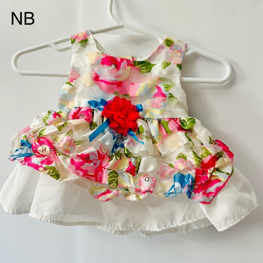 Baby girls dress by George. Excellent condition Size NB